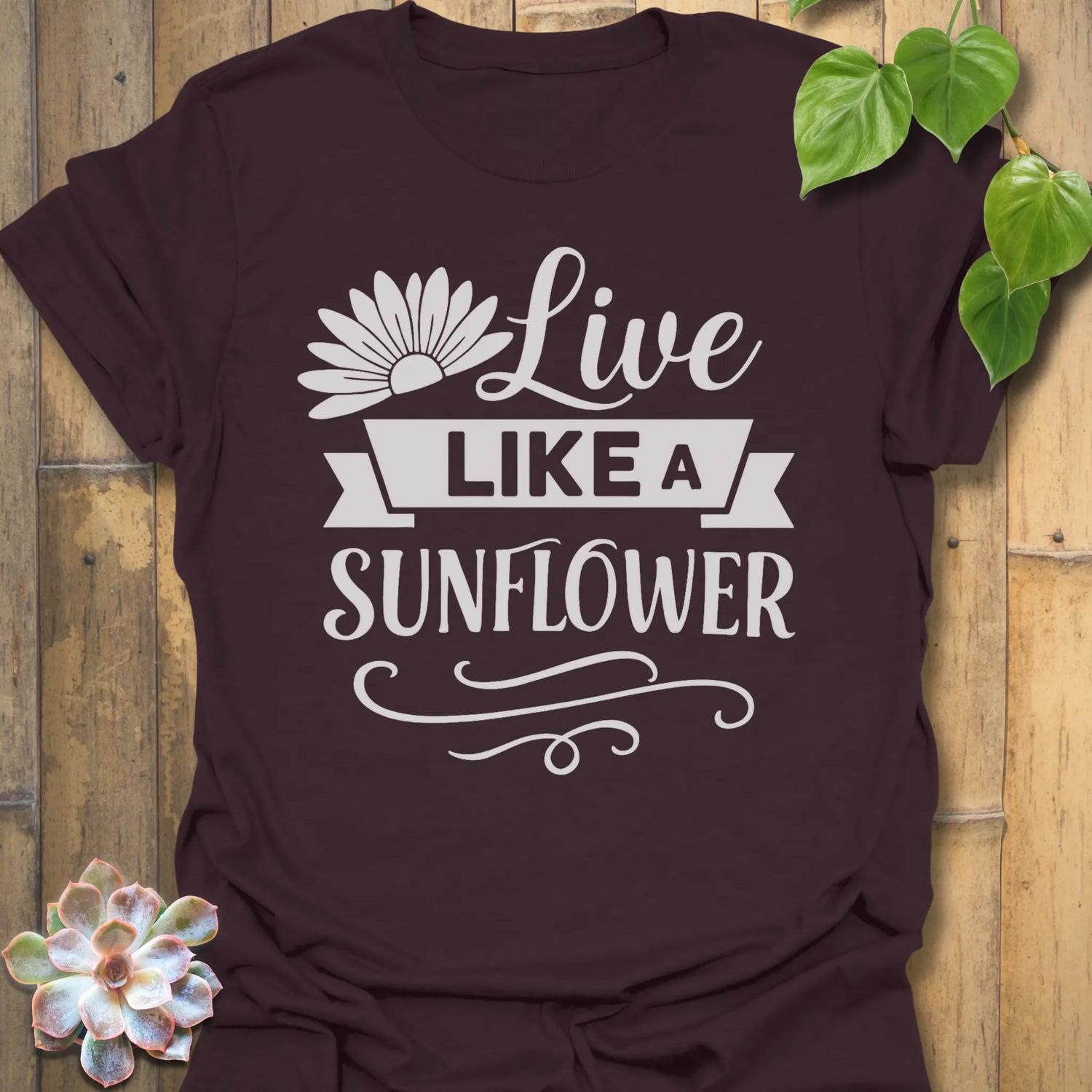Dark Chocolate t-shirt featuring the design Live Like A Sunflower printed in bold black letters, sunflower lover shirt.