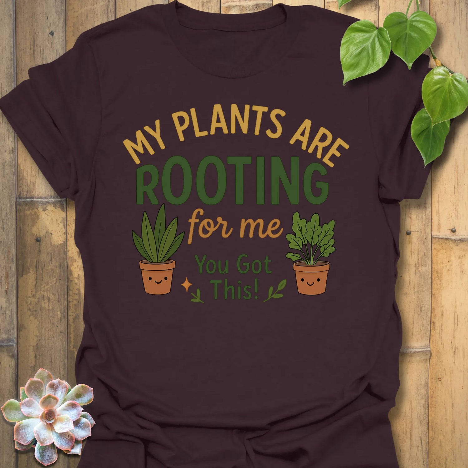 Dark Chocolate t-shirt featuring the design Plants Are Rooting printed in bold letters, gardening graphic tee.