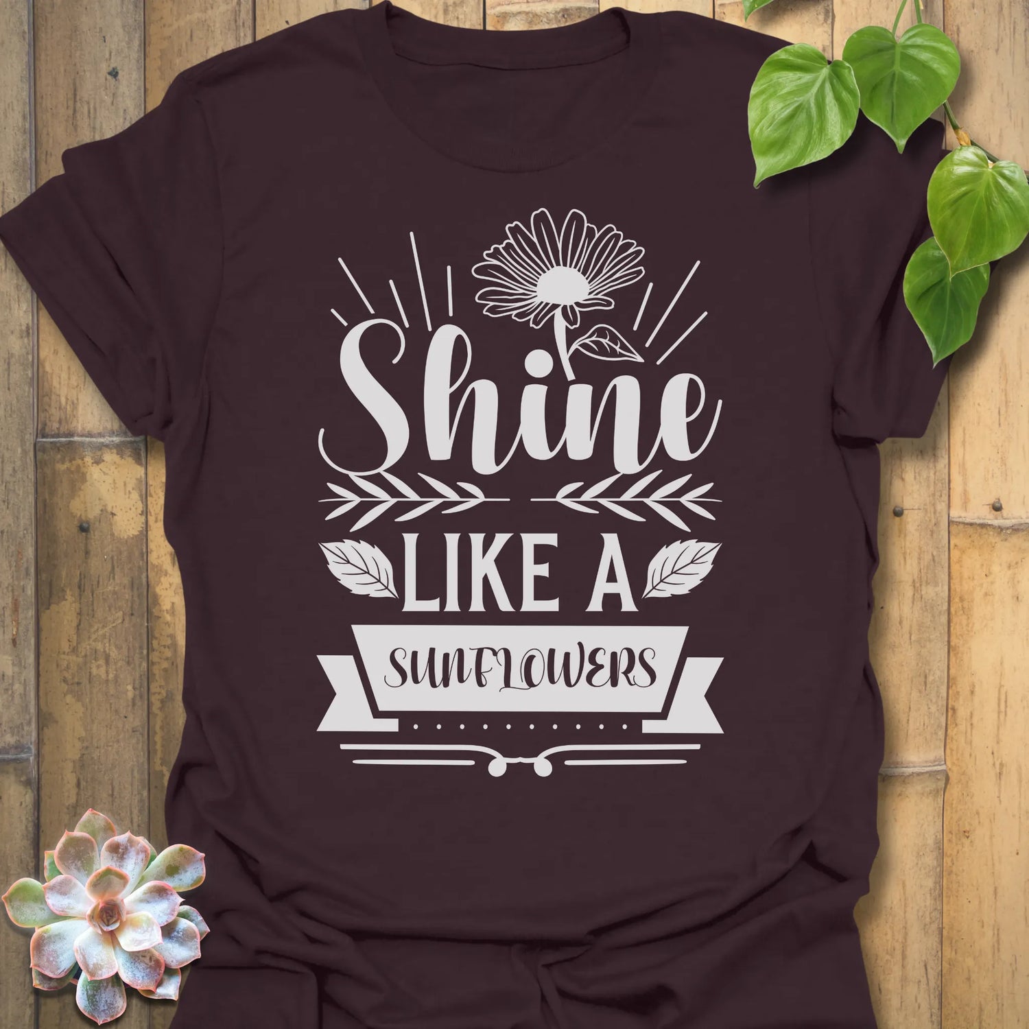 Dark Chocolate t-shirt featuring the design Shine Like A Sunflower printed in bold letters, sunflower lover shirt.