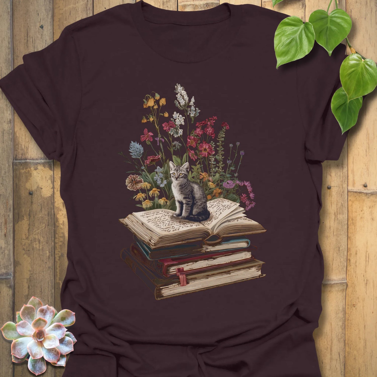 Dark Chocolate t-shirt featuring the design Whiskers &amp; Words printed in books and cats with flowers, cat lover reading shirt.