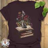 Dark Chocolate t-shirt featuring the design Whiskers & Words printed in books and cats with flowers, cat lover reading shirt.