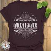 Dark Chocolate t-shirt featuring the design Wildflower printed in bold white letters, floral graphic shirt.