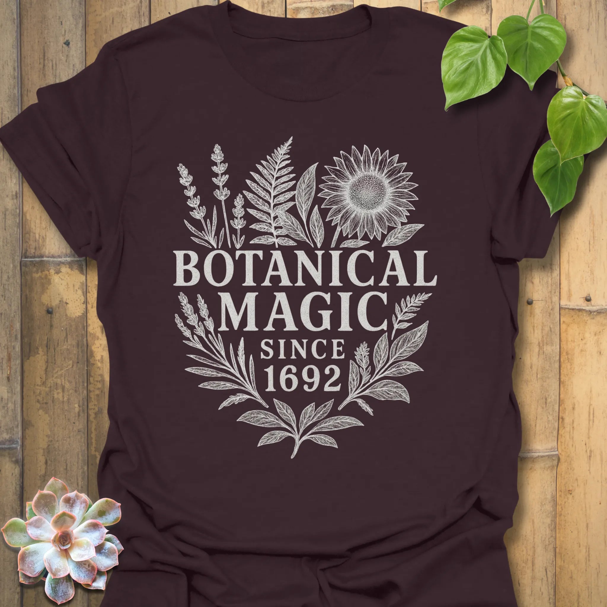 Dark Chocolatet-shirt featuring the design Botanical Magic printed in bold letters, floral graphic tee.