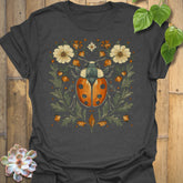 Dark Heather t-shirt featuring the design Blossom Beetle printed in nature-inspired floral beetle shirt.
