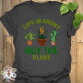 Dark Heather t-shirt featuring the design Buy The Plant printed in bold letters, funny gardening shirt.
