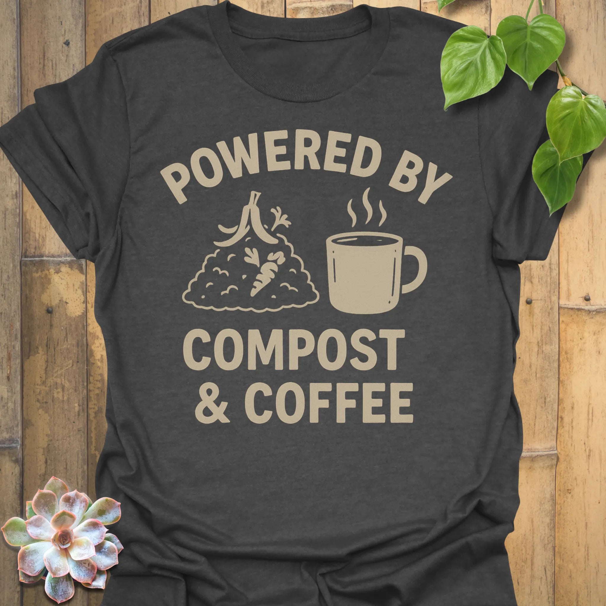 Dark Heather t-shirt featuring the design Compost &amp; Coffee printed in bold letters, eco-conscious garden tee.