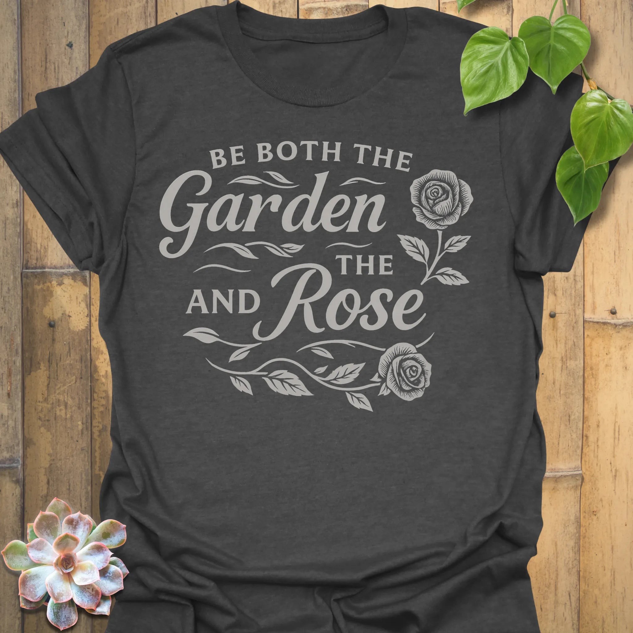 Dark Heather t-shirt featuring the design Garden And The Rose printed in soft floral tones, stylish plant lover shirt.