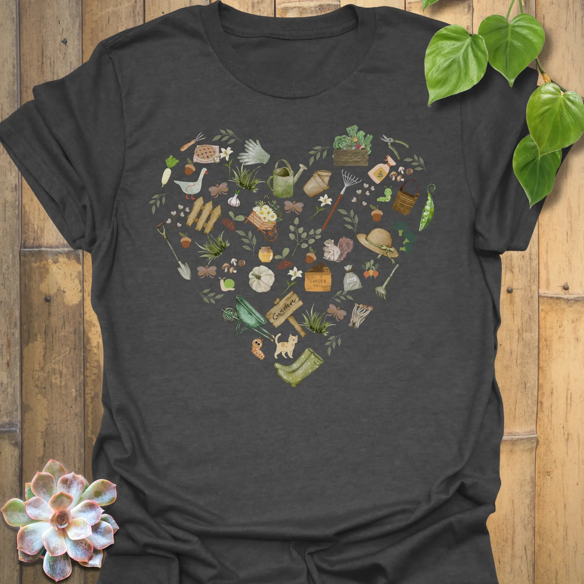 Dark Heather t-shirt featuring the design Gardening Loveheart printed in gardening graphic, perfect for plant lovers.