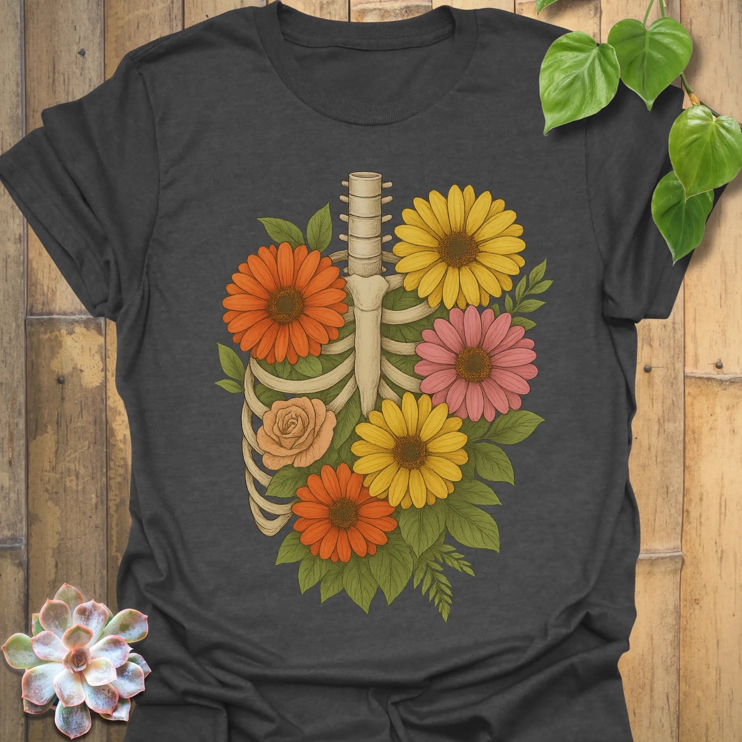 Dark Heather t-shirt featuring the design Gerbera Bones printed in floral skeleton graphic tee.