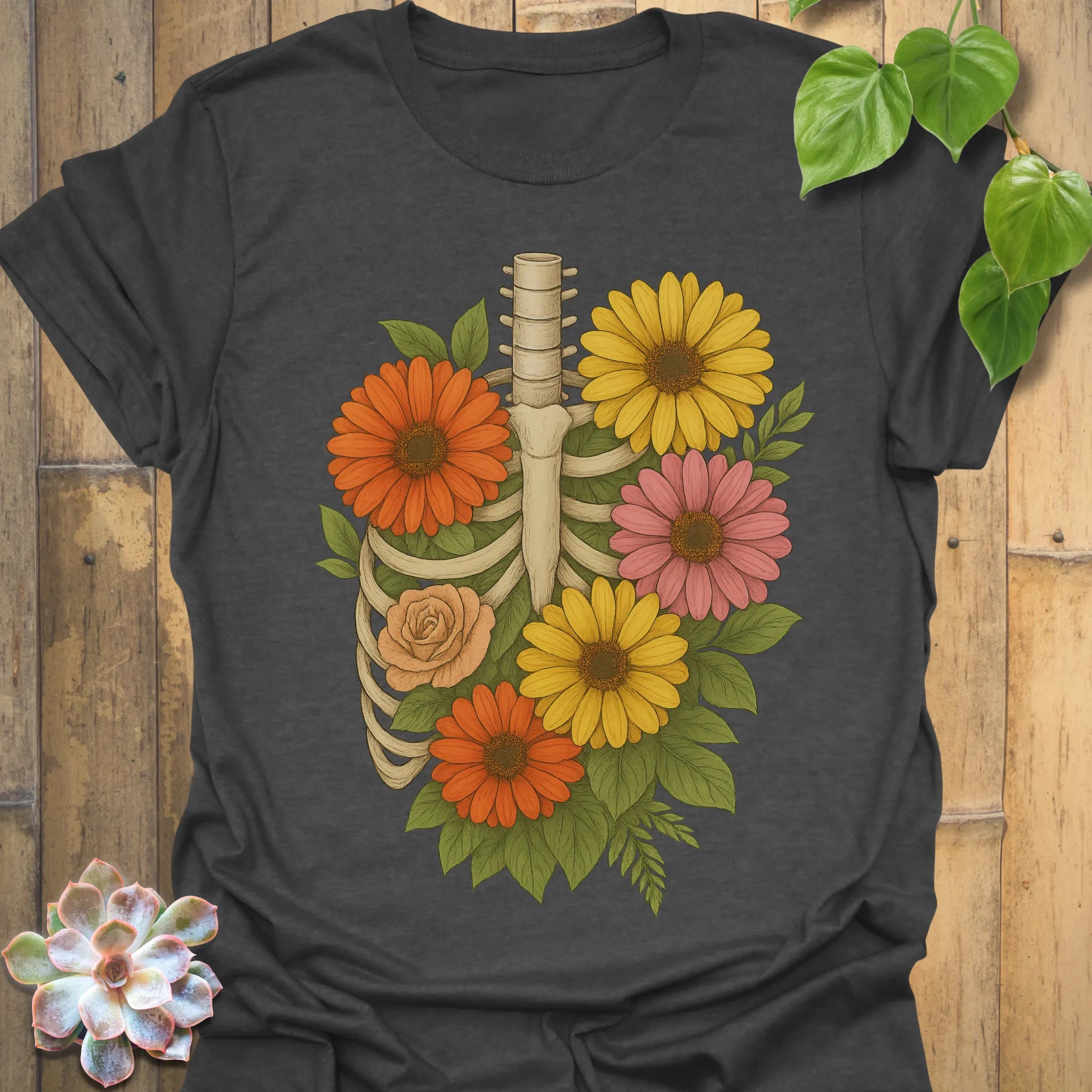 Dark Heather t-shirt featuring the design Gerbera Bones printed in floral skeleton graphic tee.