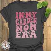 Dark Heather t-shirt featuring the design In My Garden Mom Era printed in bold letters, gardening shirt for moms.