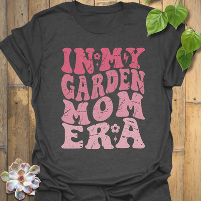 Dark Heather t-shirt featuring the design In My Garden Mom Era printed in bold letters, gardening shirt for moms.
