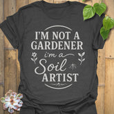 Dark Heather t-shirt featuring the design Soil Artist printed in bold letters, funny garden shirt.