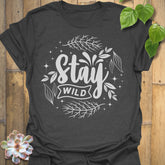 Dark Heather t-shirt featuring the design Stay Wild printed in bold white letters, floral graphic lover shirt.