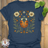 Heather Navy t-shirt featuring the design Blossom Beetle printed in nature-inspired floral beetle shirt.