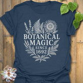 Heather Navy t-shirt featuring the design Botanical Magic printed in bold letters, floral graphic tee.