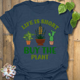 Heather Navy t-shirt featuring the design Buy The Plant printed in bold letters, funny gardening shirt.