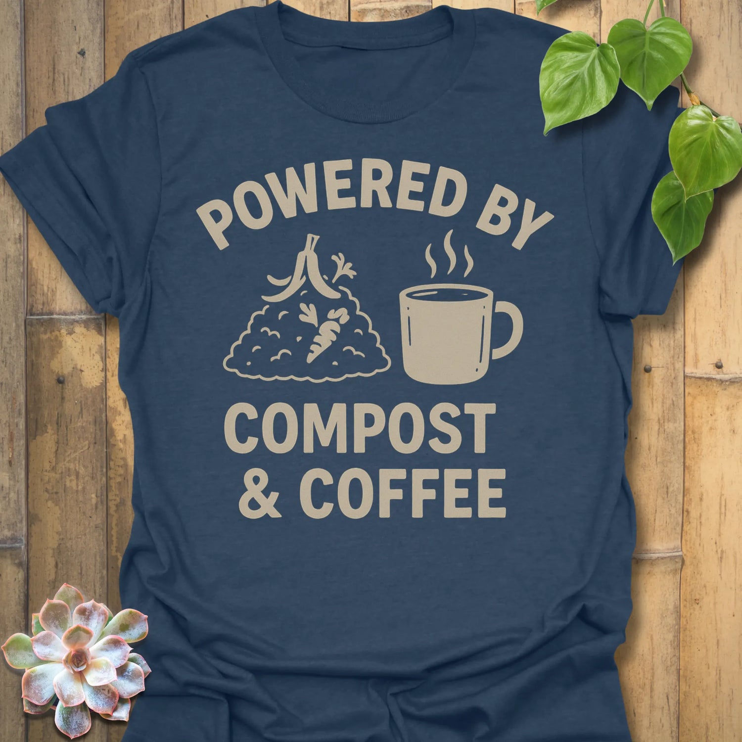 Heather Navy t-shirt featuring the design Compost &amp; Coffee printed in bold letters, eco-conscious garden tee.
