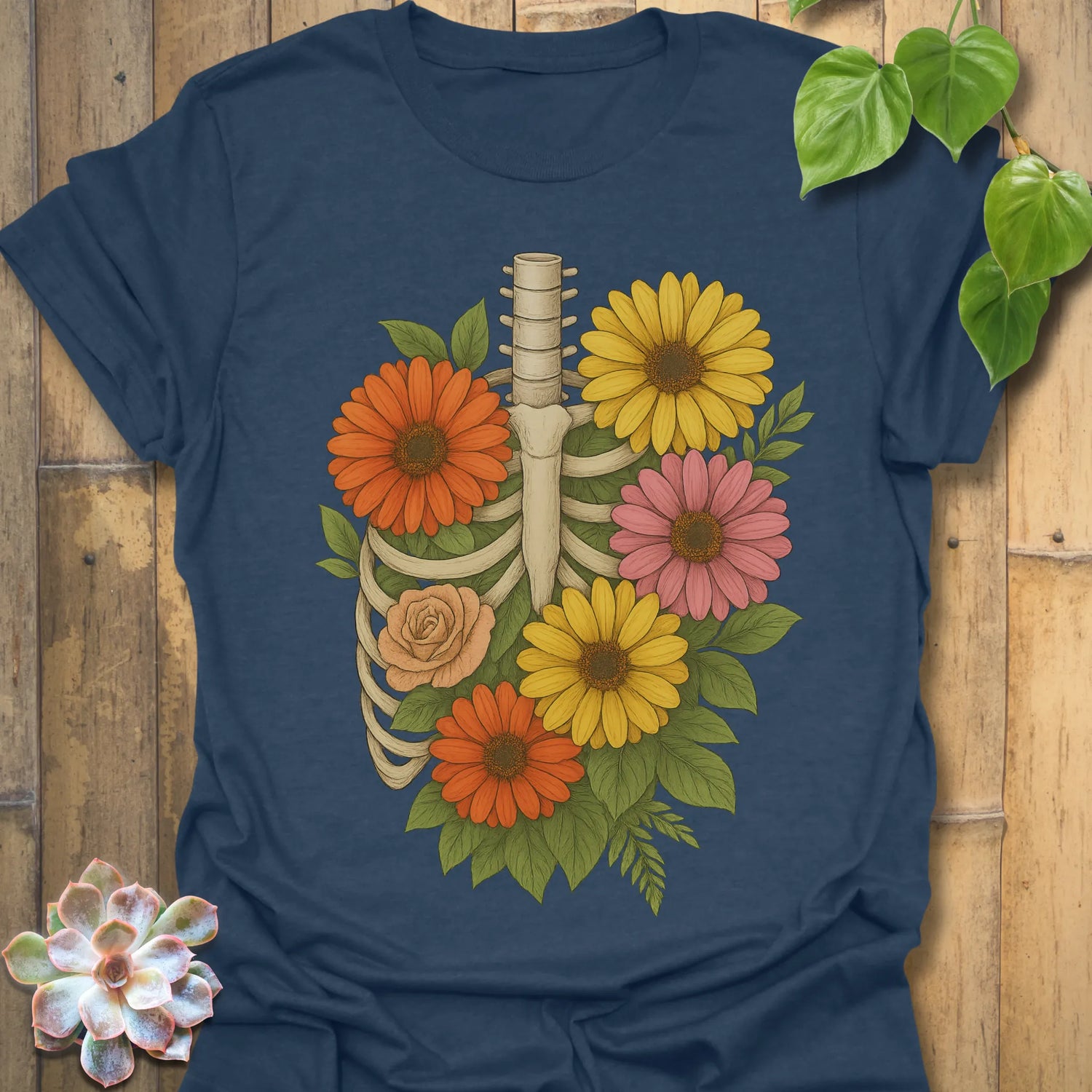 Heather Navy t-shirt featuring the design Gerbera Bones printed in floral skeleton graphic tee.