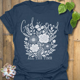 Heather Navy t-shirt featuring the design God Is Good printed in black letters, religious faith shirt.