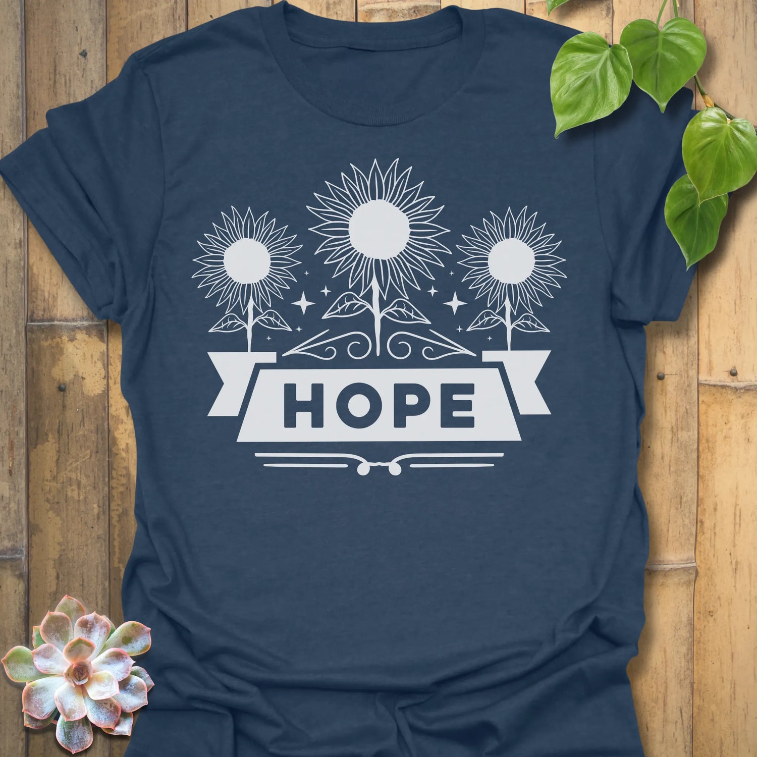 Heather Navy t-shirt featuring the design Hope printed in sunflower and bold letters, positive vibe t-shirt.