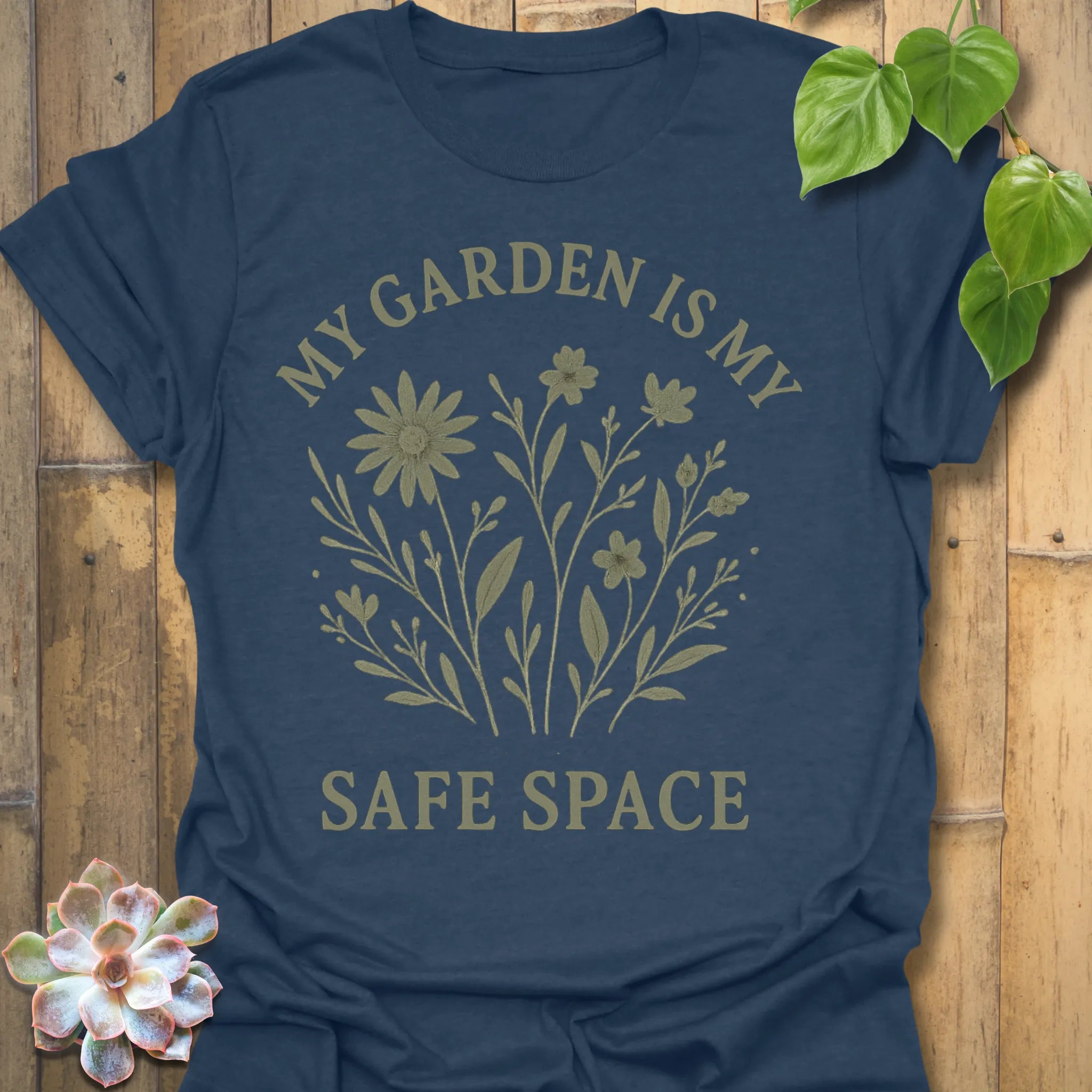 Heather Navy t-shirt featuring the design My Safe Place printed in bold letters, warm tone mindfulness shirt.