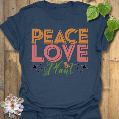 Heather Navy t-shirt featuring the design Peace Love Plant printed in bold letters, gardening lover shirt.