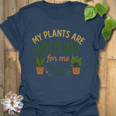 Heather Navy t-shirt featuring the design Plants Are Rooting printed in bold letters, gardening graphic tee.