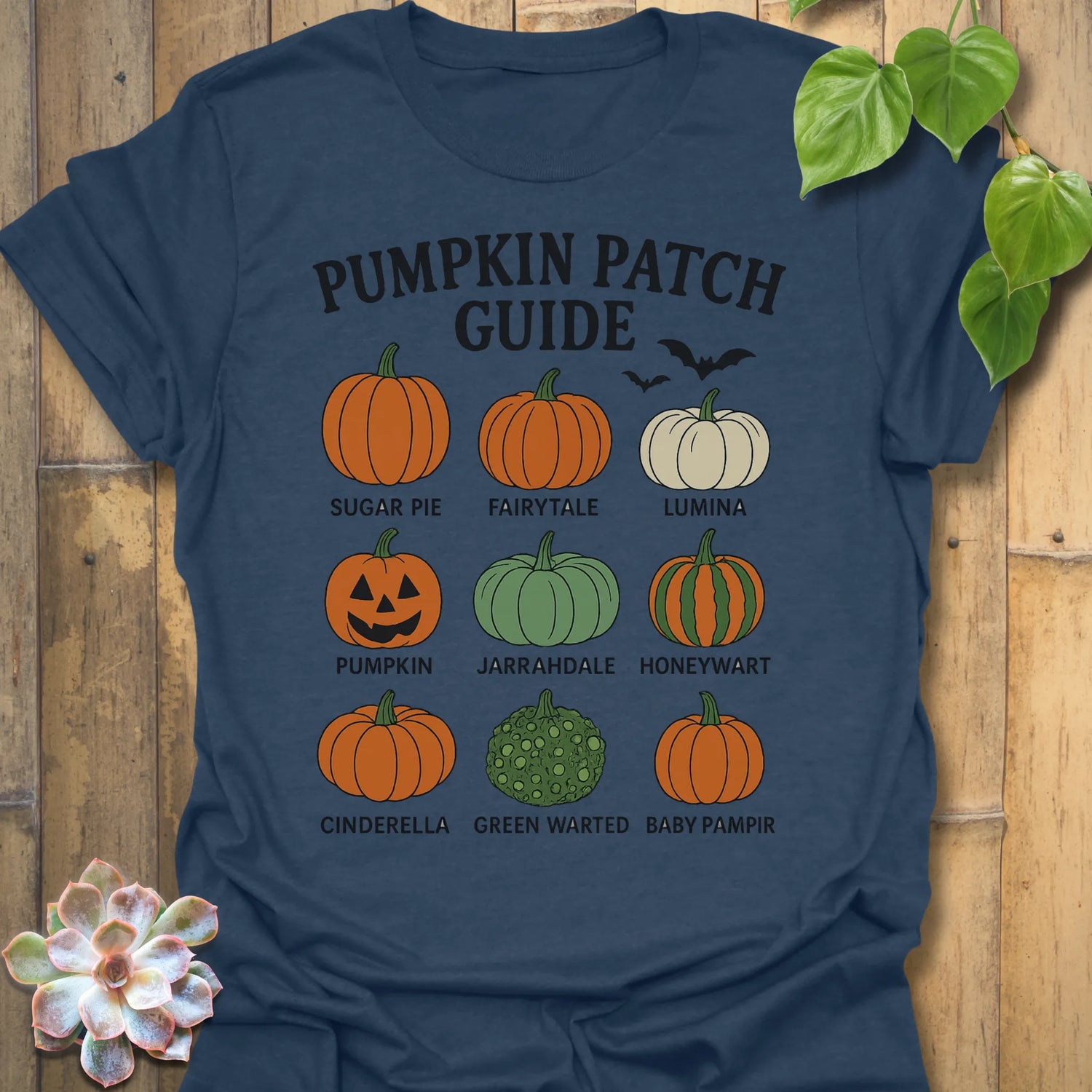 Heather Navy t-shirt featuring the design Pumpkin Patch Guide printed in black letters, Halloween pumpkin tee.
