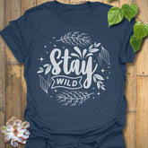 Heather Navy t-shirt featuring the design Stay Wild printed in bold white letters, floral graphic lover shirt.