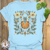 Light Blue t-shirt featuring the design Blossom Beetle printed in nature-inspired floral beetle shirt.