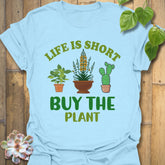 Light Blue t-shirt featuring the design Buy The Plant printed in bold letters, funny gardening shirt.
