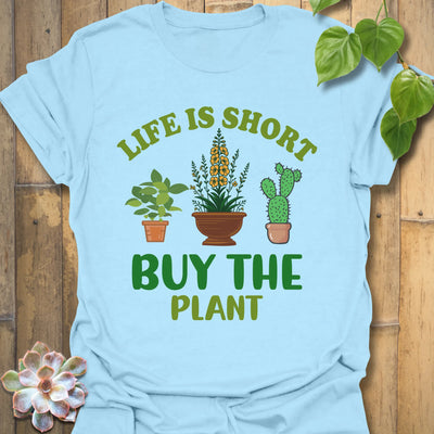 Light Blue t-shirt featuring the design Buy The Plant printed in bold letters, funny gardening shirt.