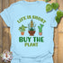 Light Blue t-shirt featuring the design Buy The Plant printed in bold letters, funny gardening shirt.