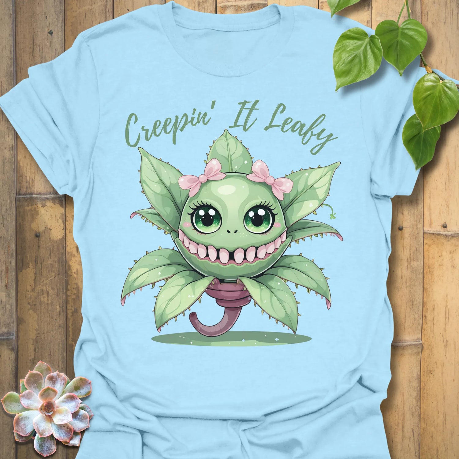 Light Blue t-shirt featuring the design Creepin’ It Leafy printed in funny garden shirt.