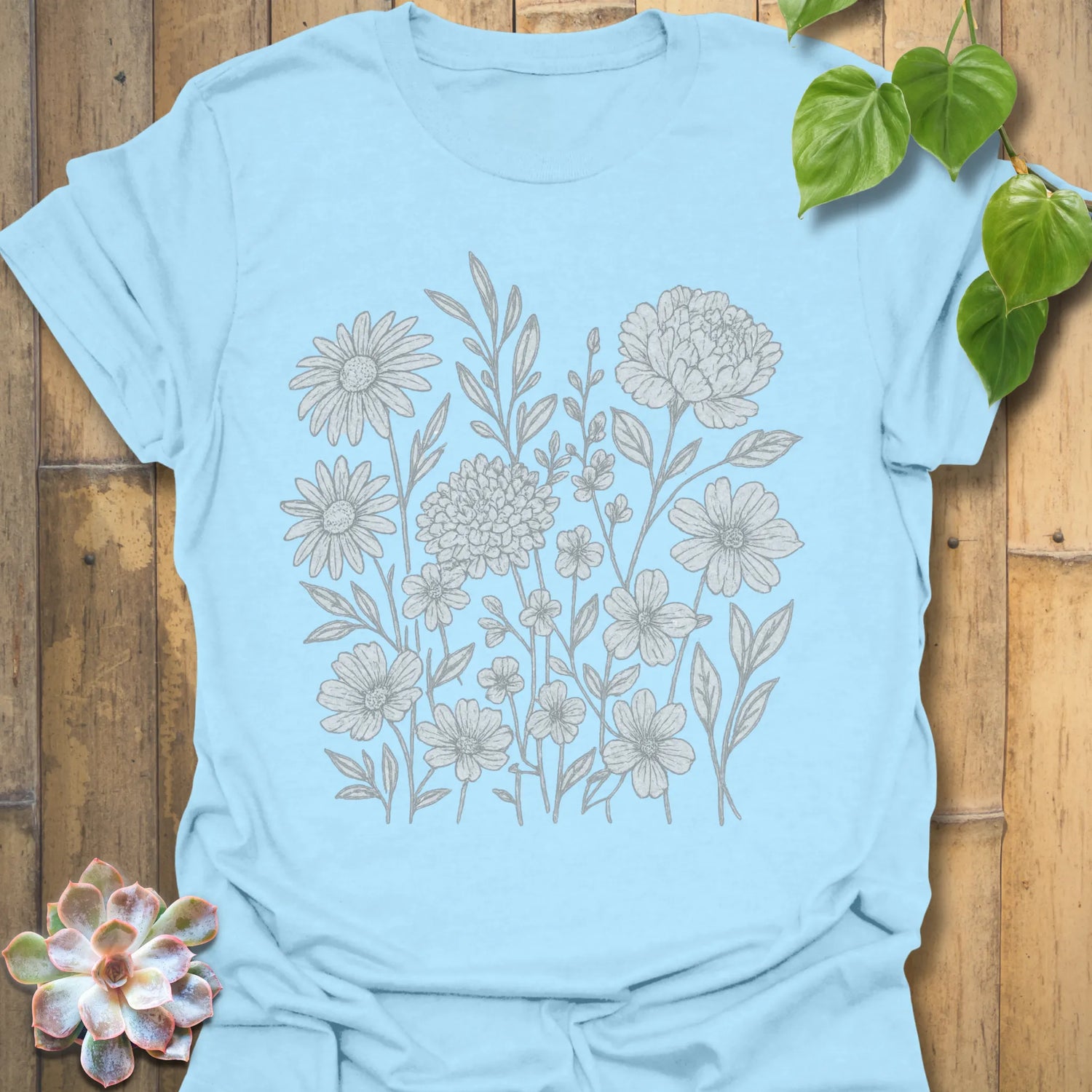 Light Blue t-shirt featuring the design Eternal Flowers printed in floral graphic, flower lover t-shirt.