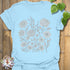 Light Blue t-shirt featuring the design Eternal Flowers printed in floral graphic, flower lover t-shirt.