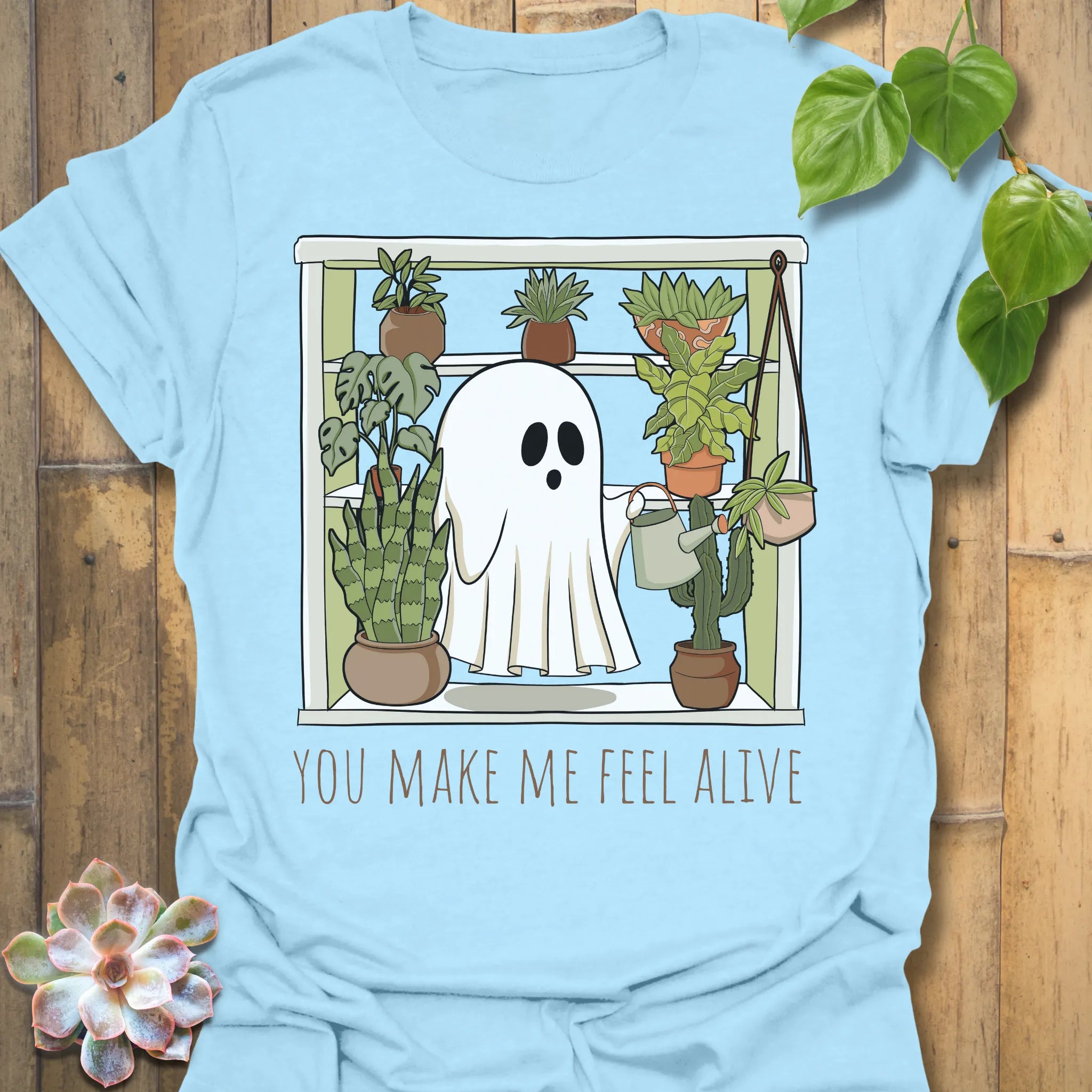 Light Blue t-shirt featuring the design Feel Alive printed halloween motivational graphic tee.