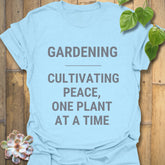 Light Blue t-shirt featuring the design Gardening Cultivating Peace One Plant at a Time, gardening gift tee.