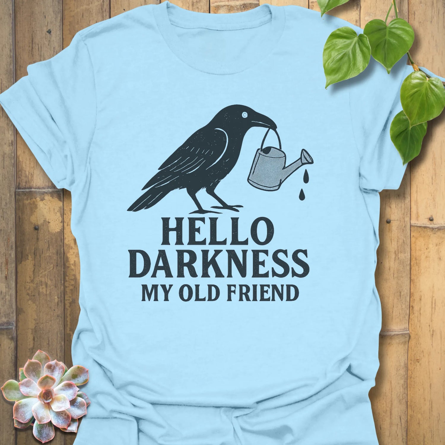 Light Blue t-shirt featuring the design Hello Darkness printed in bold white letters, halloween lover graphic shirt.