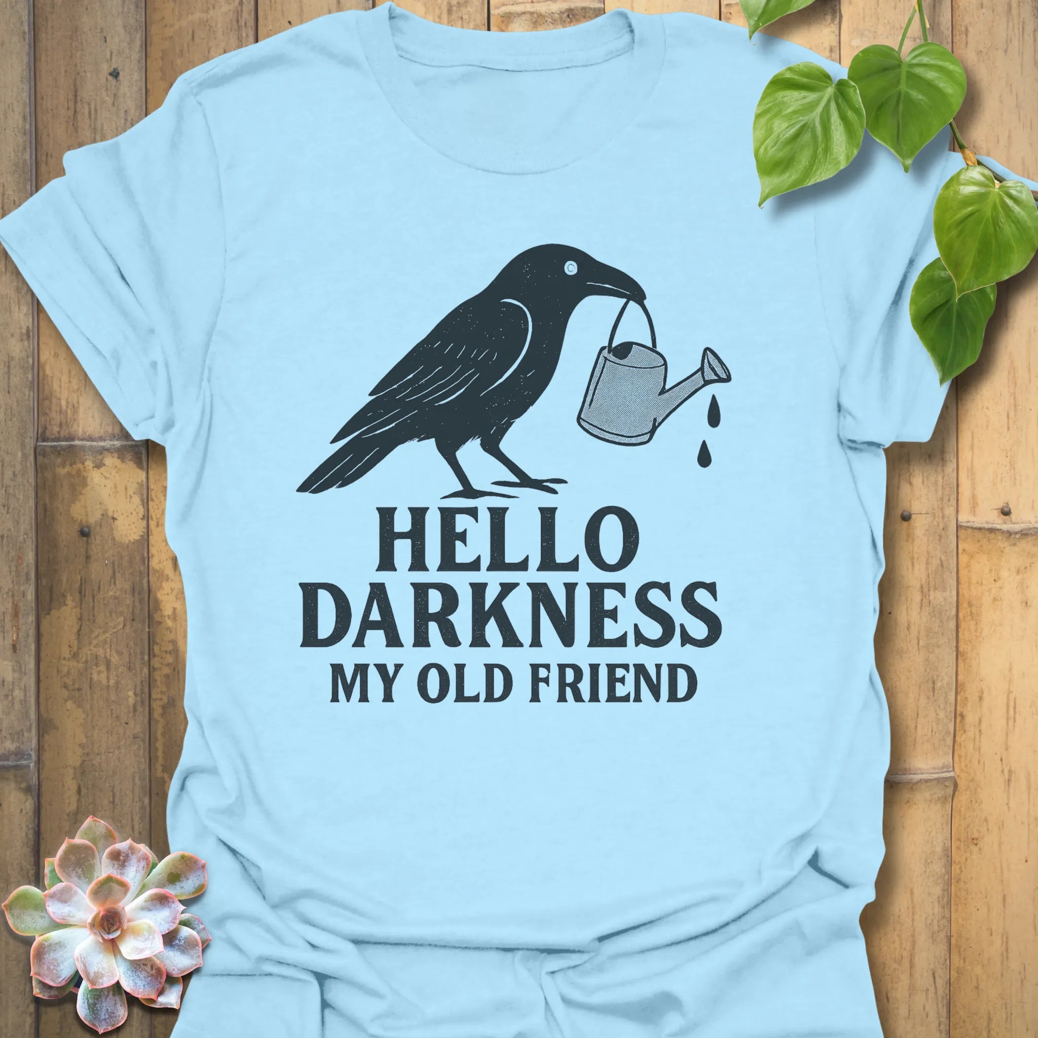 Light Blue t-shirt featuring the design Hello Darkness printed in bold white letters, halloween lover graphic shirt.