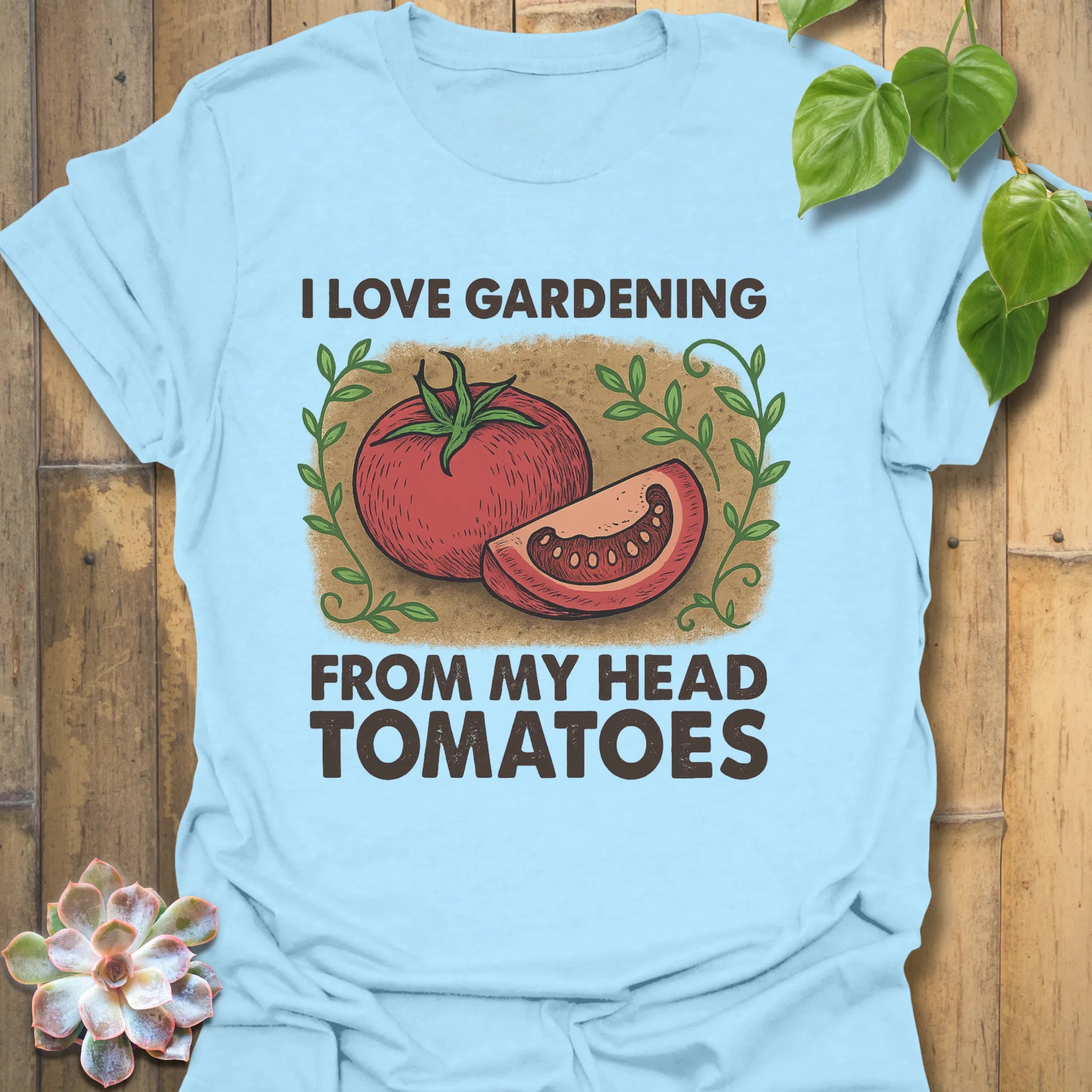 Light Blue t-shirt featuring the design I Love Gardening printed in bold letters, garden lover t-shirt.