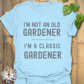 Light Blue t-shirt featuring the design “I’m not an older gardener, I’m a classic gardener” garden lover t-shirt.