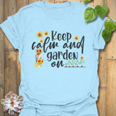 Light Blue t-shirt featuring the design Keep Calm and Garden On, stylish garden t-shirt.