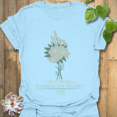 Light Blue t-shirt featuring the design May Lily of the Valley with Rose flower print, a stylish floral graphic tee for everyday wear.