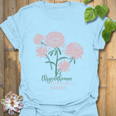 Light Blue t-shirt featuring the design November Chrysanthemum with a chrysanthemum flower print, trendy floral graphic tee for casual outfits.