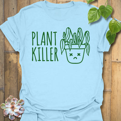 Light Blue t-shirt featuring the design Plant Killer printed in bold green letters, funny plant lover shirt.