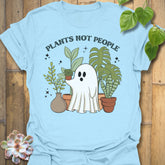 Light Blue t-shirt featuring the design Plants Not People printed in bold white letters, halloween plant lover graphic tee.