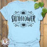 Light Blue t-shirt featuring the design Sunflower printed inbold white, sunflower floral graphic tee.