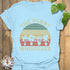 Light Blue t-shirt featuring the design The Plant Whisperer with a plant in a pot, a fun gardening shirt for gardeners
